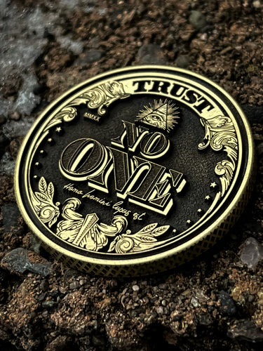 TRUST NO ONE BRASS COIN